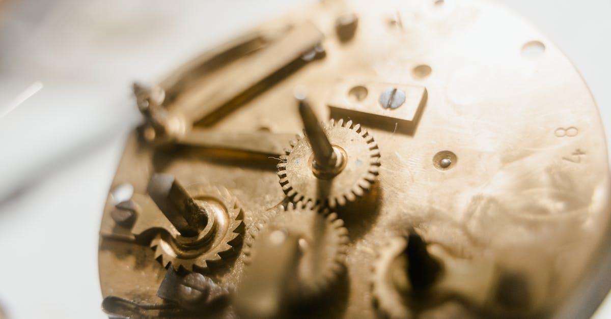 detailed view of a vintage clockwork mechanism showcasing intricate gears and metallic components